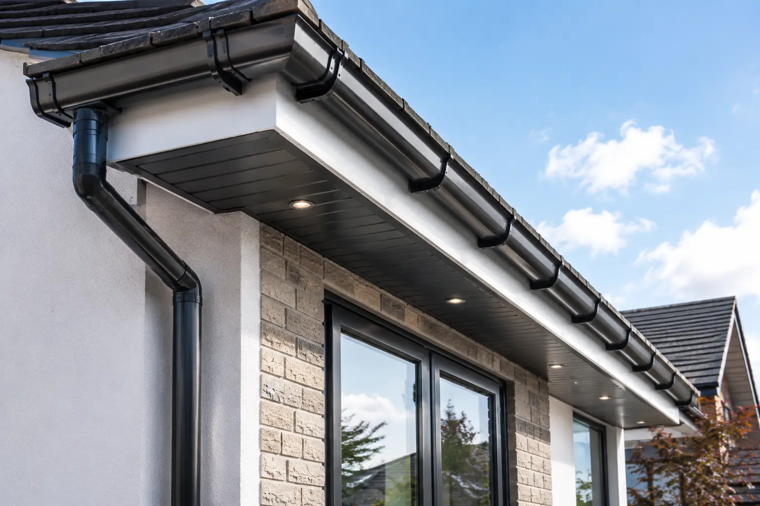 Clean fascia soffit gutter and downpipe finish