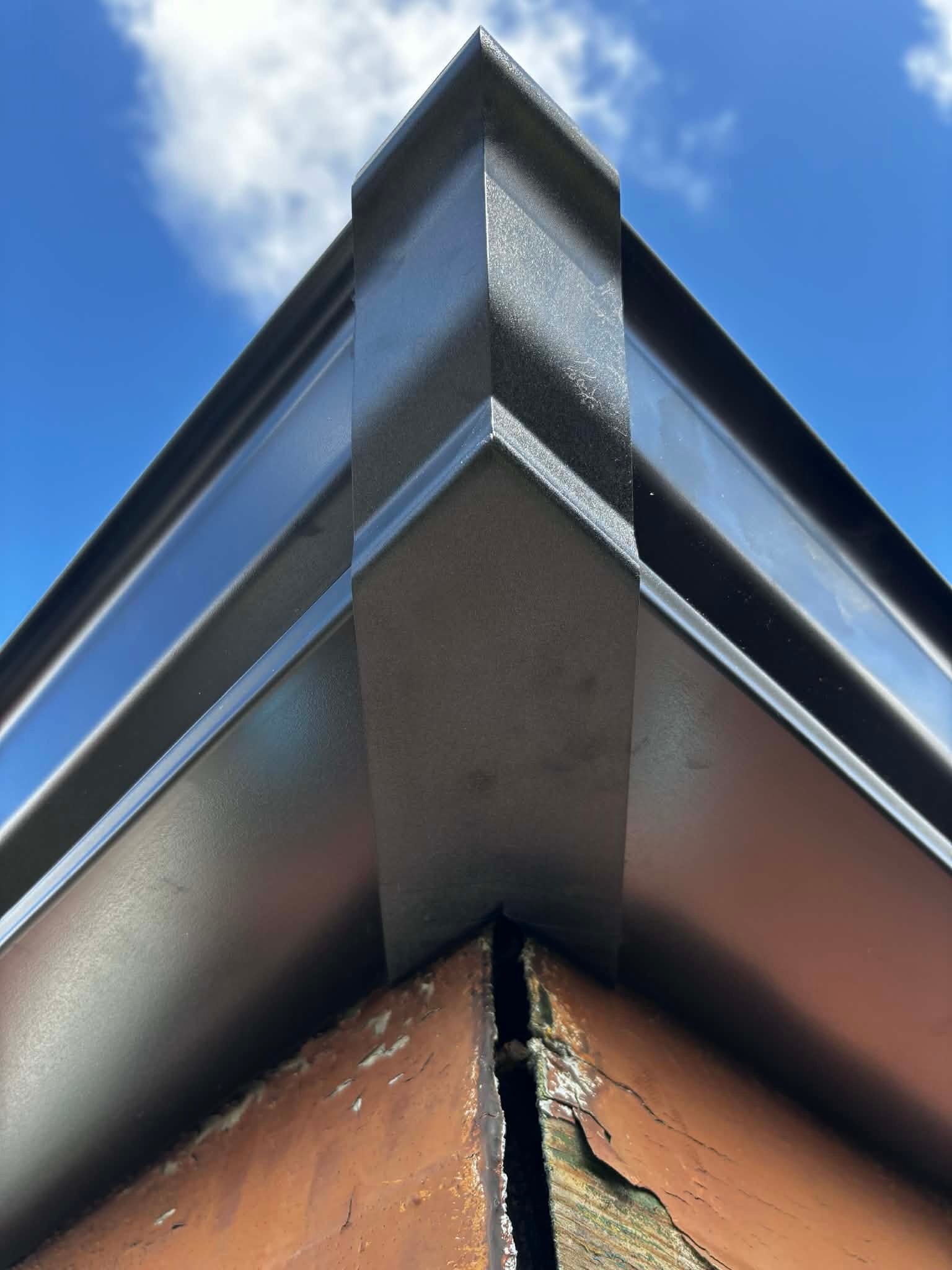 Roof gutter corner angle with clean installation finish in Sheffield